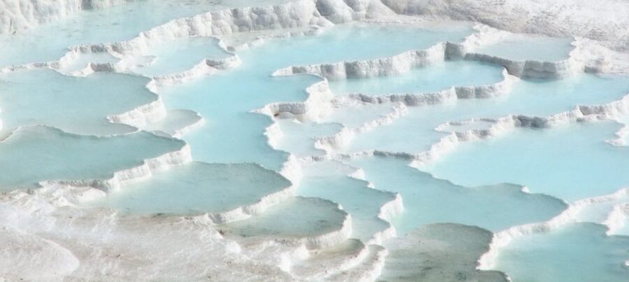 From Kusadasi and Selcuk: Pamukkale and Hiearapolis Tour - Calcium Terraces and the Sacred Pool: The Mineral-Water Moment