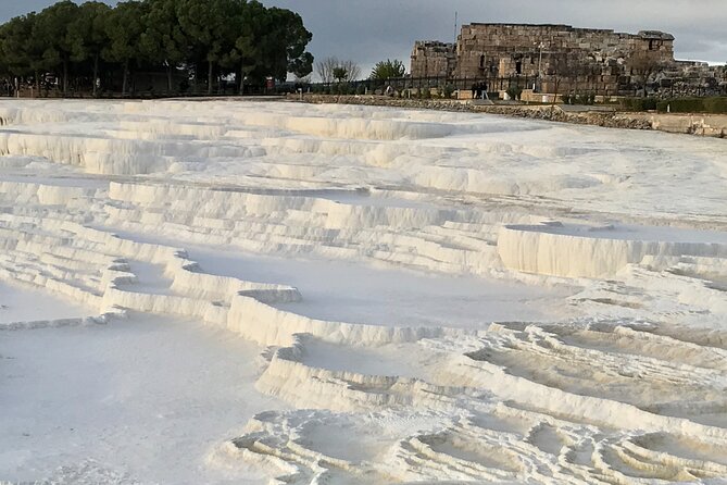 Full Day Pamukkale Terraces and Hierapolis Ruins Tour - Hierapolis: Roman Baths, Temple of Apollo, and Necropolis Views