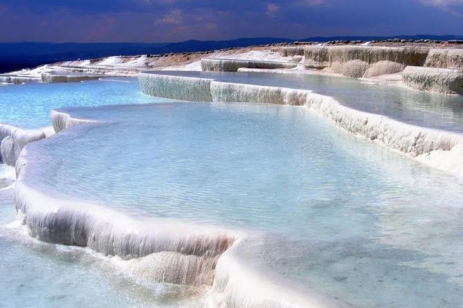 Pamukkale Small Group Tour From Kusadasi or Selcuk - Stop 2 at Pamukkale thermal pools: walk the terraces, manage the hot water, skip Cleopatra if you want